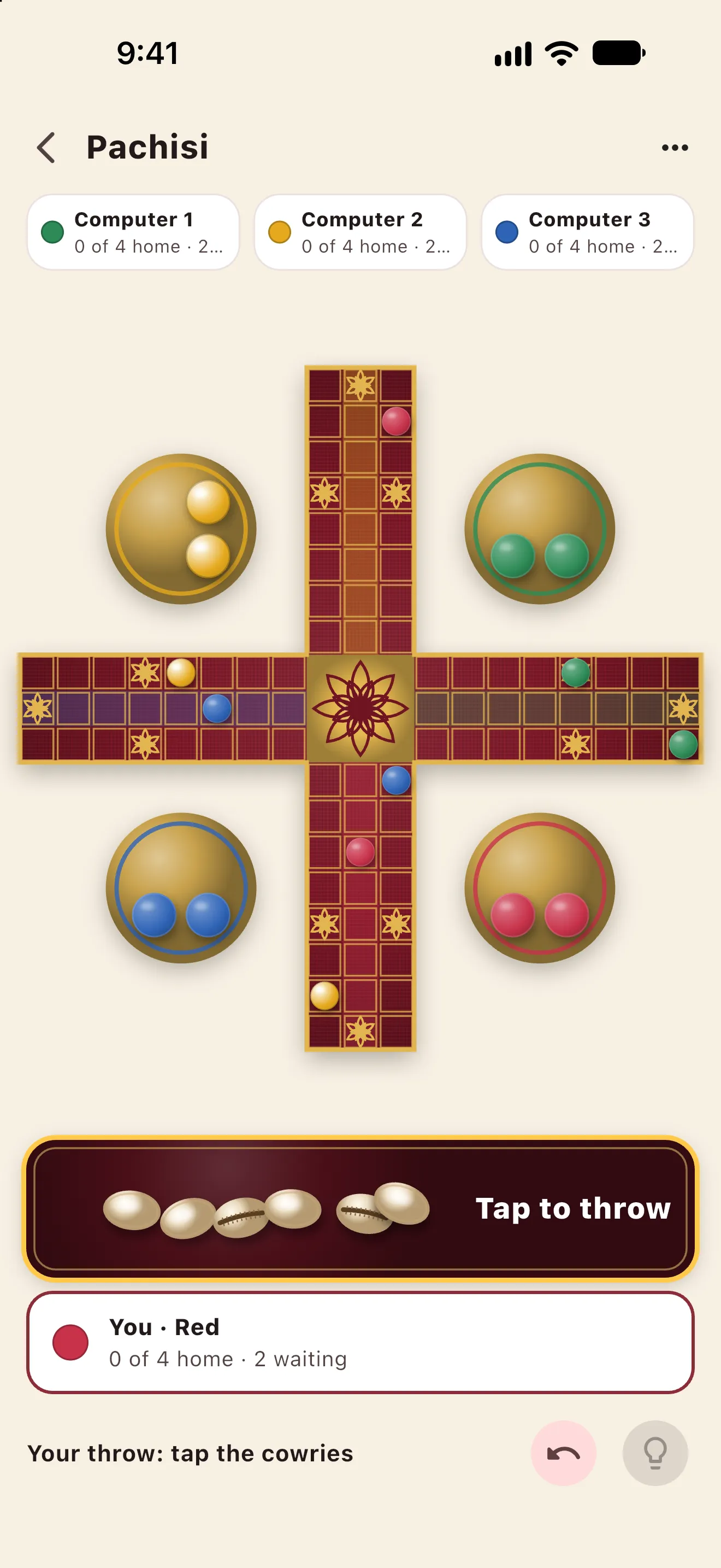 Imli Pachisi: the royal cross board with three computer players and the cowrie tray ready to throw