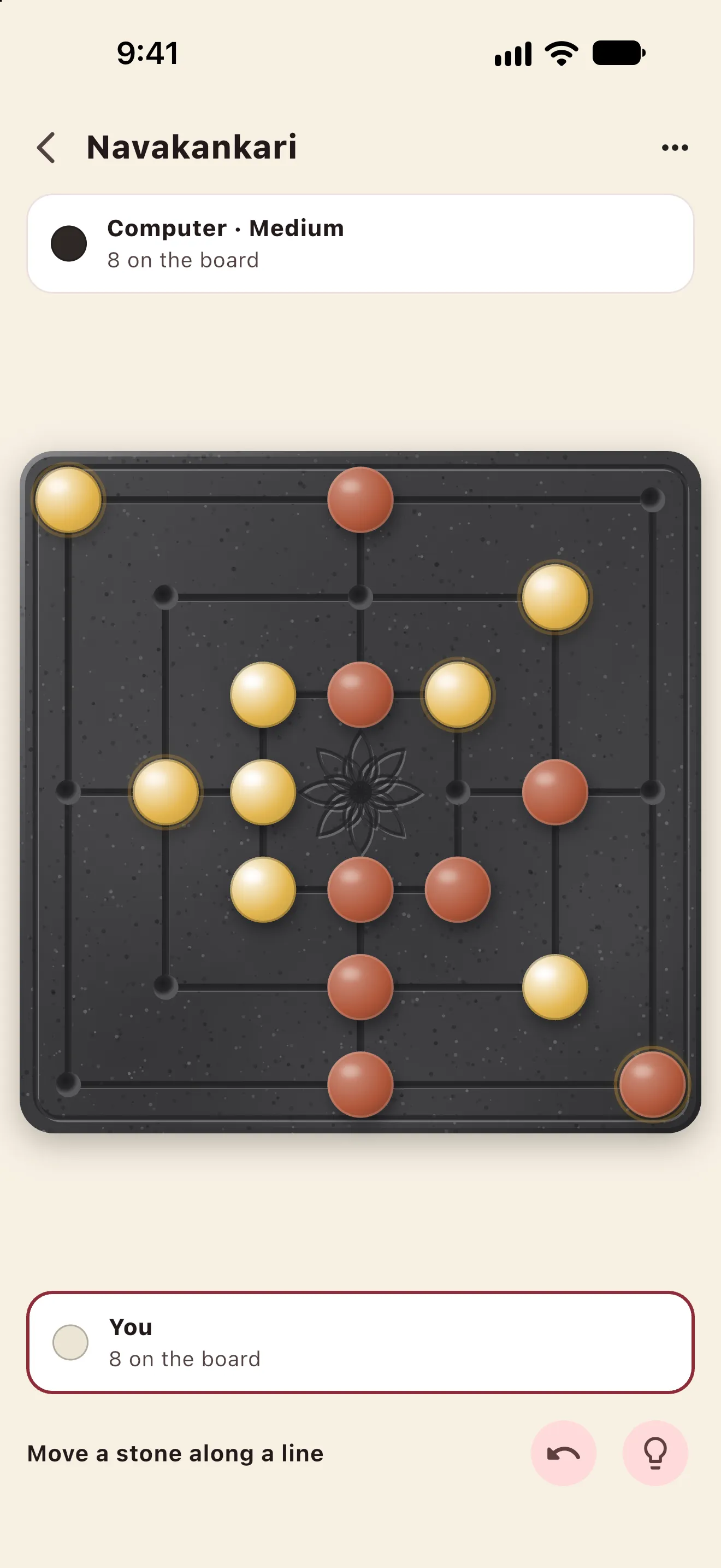 Imli Navakankari on a black granite board with brass pieces, a Royal theme